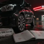 Quelle voiture choisir quand on roule peu : essence hybride électrique, citadine de nuit sur parking